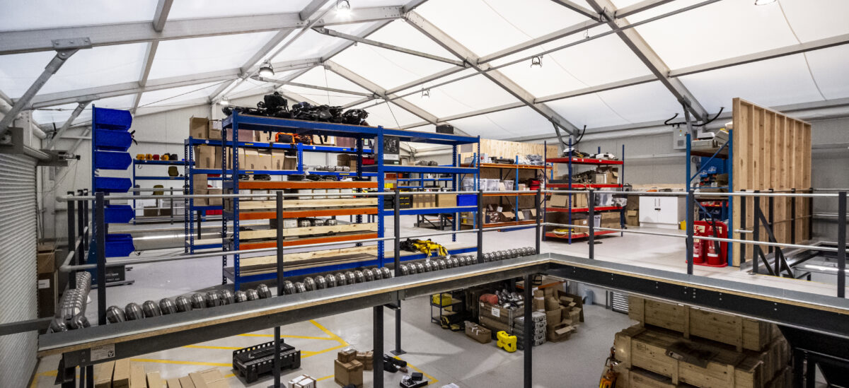 Temporary storage warehouse with racking