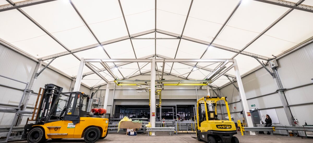 Large warehouse storing heavy machinery within