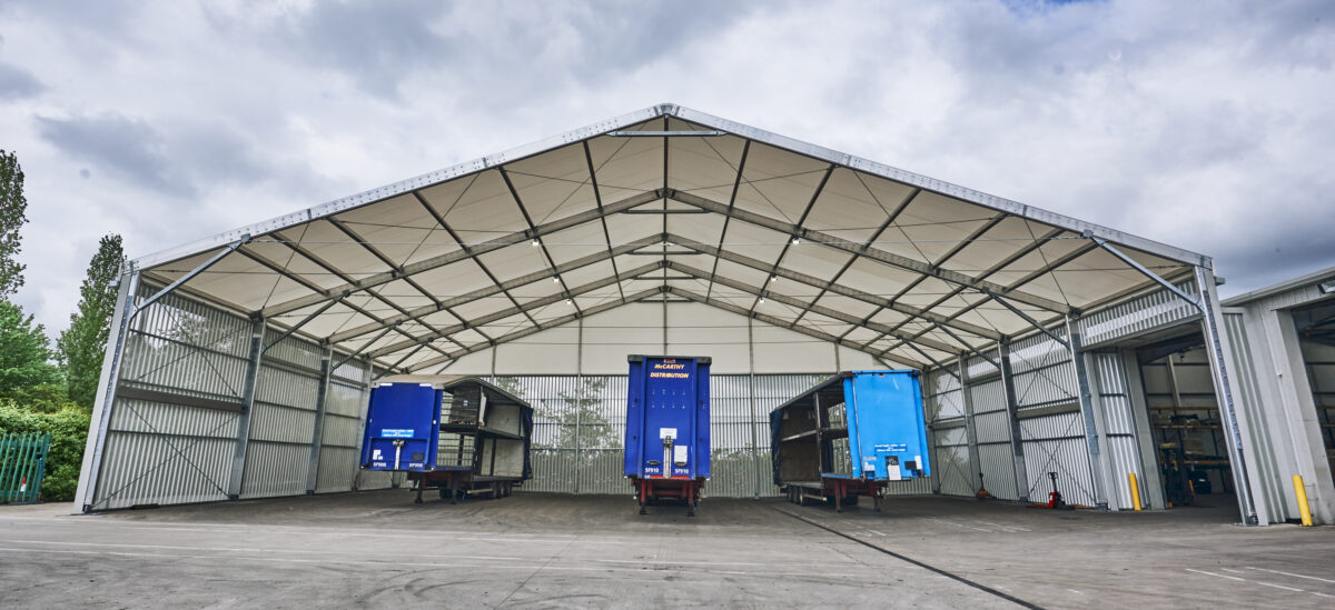 Industrial loading canopy installed by Spaciotempo at McCarthy Haulage in Wrexham.