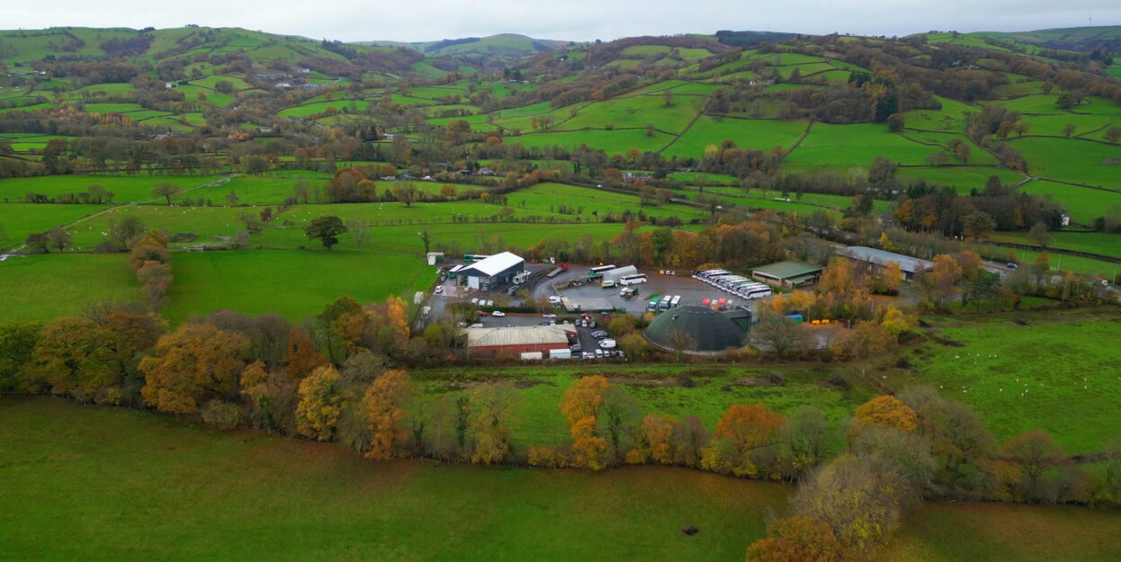 overhead view of a group of buildings within a set of fields