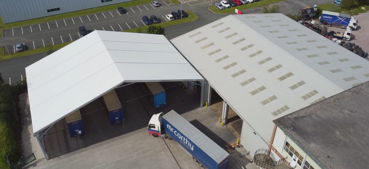 Industrial loading canopy installed by Spaciotempo at McCarthy Haulage in Wrexham.