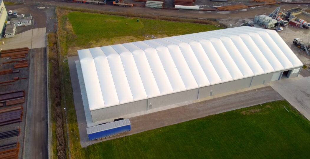 Drone shot of semi permanent storage warehouse for IPN
