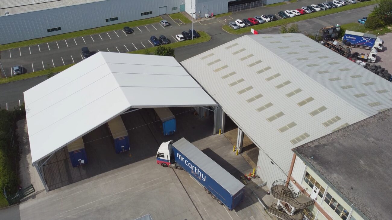 Industrial loading canopy installed by Spaciotempo at McCarthy Haulage in Wrexham.