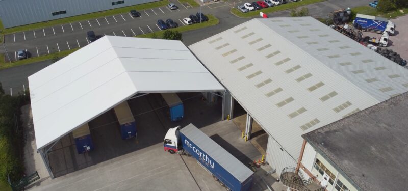 Industrial loading canopy installed by Spaciotempo at McCarthy Haulage in Wrexham.