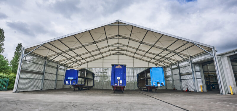 Industrial loading canopy installed by Spaciotempo at McCarthy Haulage in Wrexham.